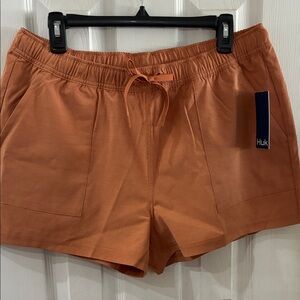 Huk Women's Athletic Shorts in Warm Orange